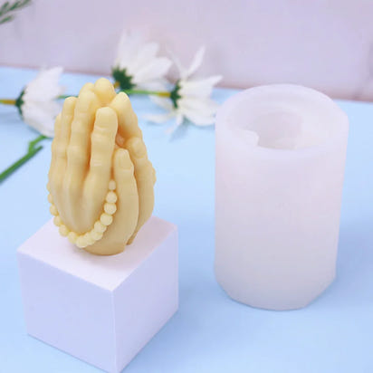 mexican style praying hands candle