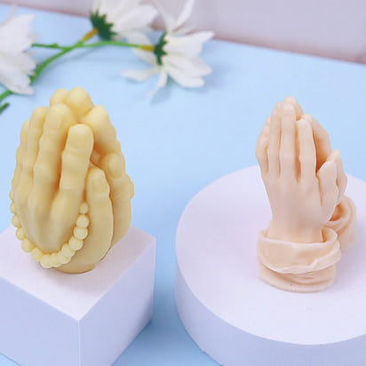 mexican style praying hands candle