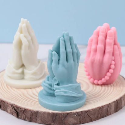 mexican style praying hands candle