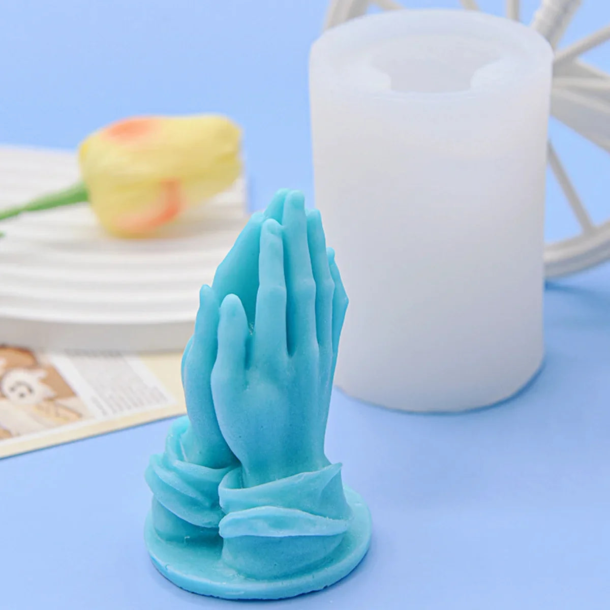mexican style praying hands candle